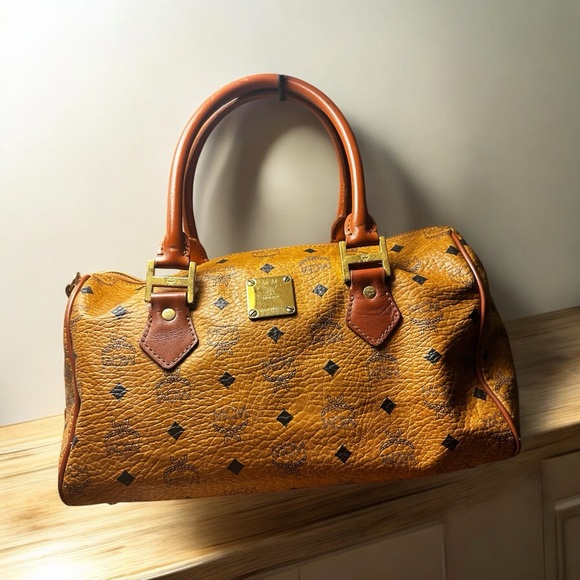 MCM Handbags - MCM Cognac Visetos Boston Bag. EUC.